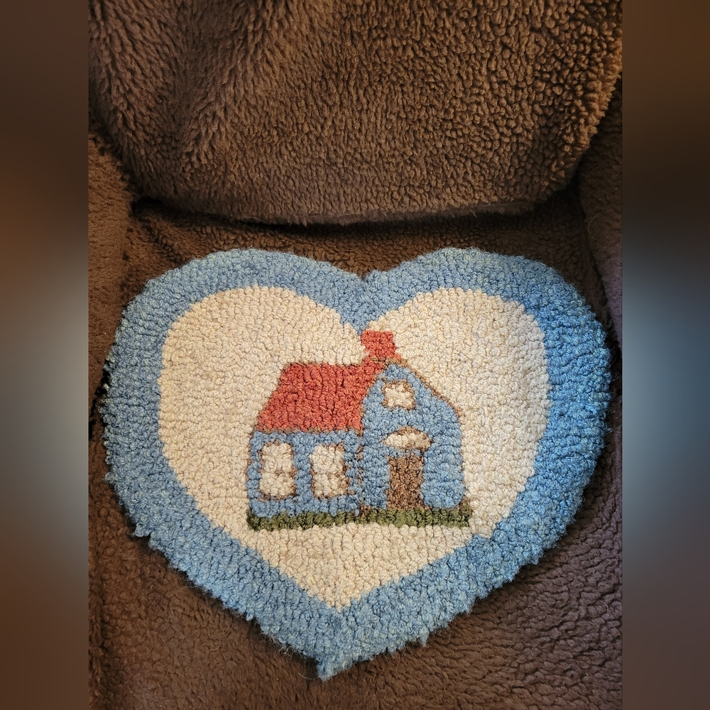 Hooked heart rug